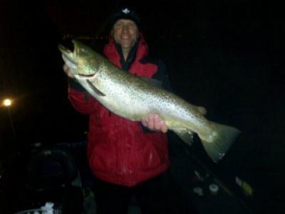 Milwaukee Harbor, WI Captain Doug Kloet with nice brown trout December 2011