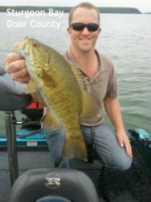 Sturgeon Bay Door county Wisconsin Capatain Doug Kloet with nice smallmouth bass May 2012