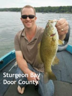 Sturgeon Bay Door county Wisconsin Captain Doug Kloet with nice smallmouth bass May 2012