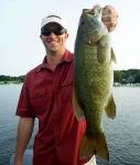Wisconsin Fishing Guide Doug Kloet With A Giant Smallmouth Bass